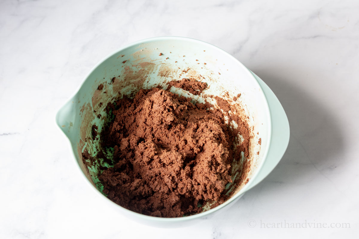 Combined cookie dough in a bowl.