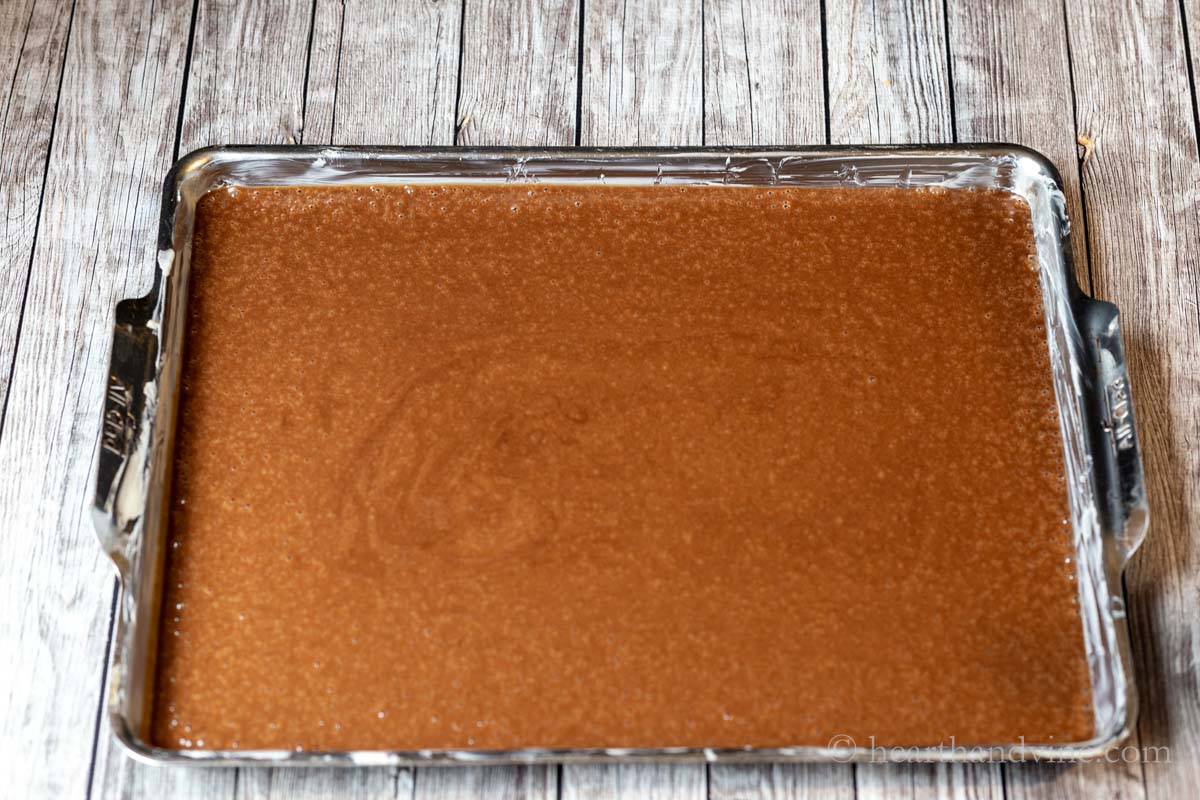 Texas sheet cake batter poured into a greased and floured sheet pan.