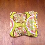 A trio of spiced mug mats wrapped with twine.