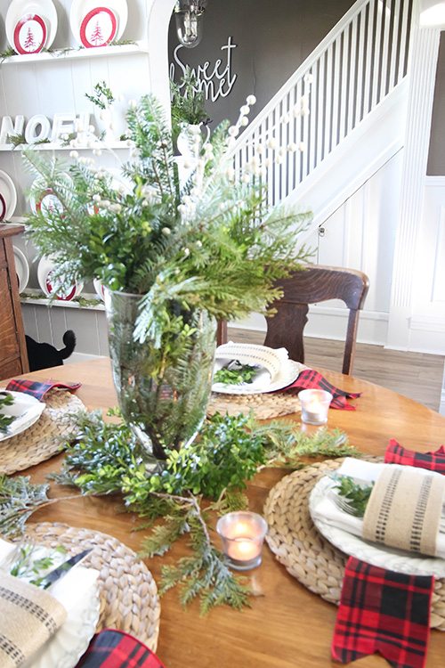 Tablescape with fresh greenery.