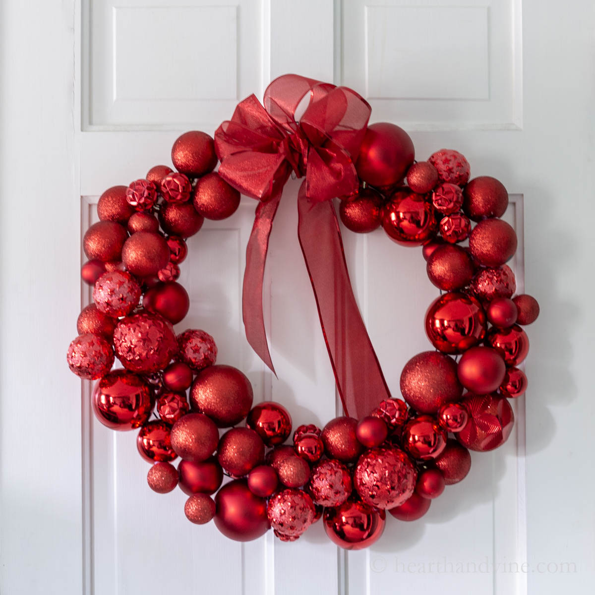 Red ornament wreath with a red bow.