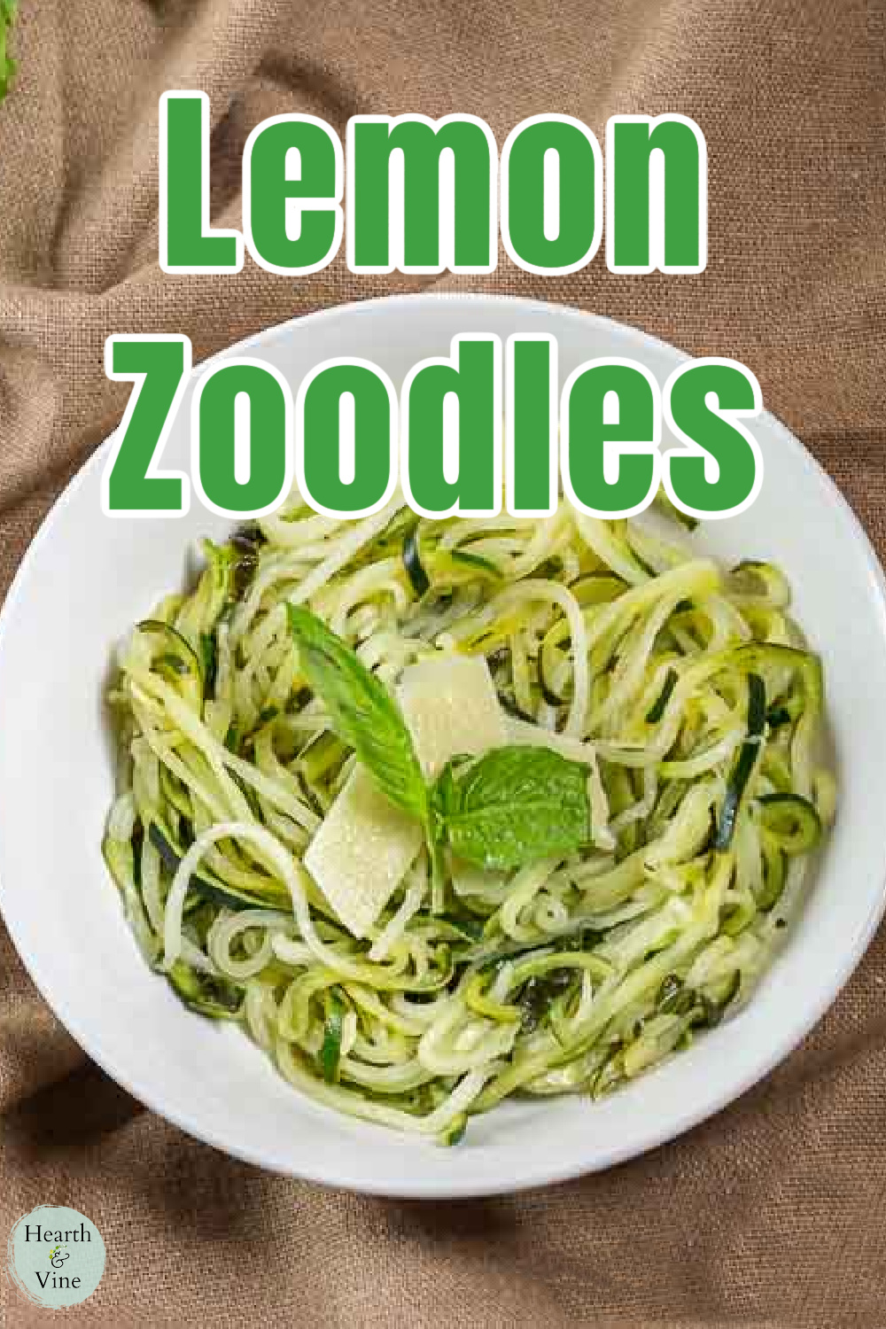 Bowl of zoodles with lemon and parmesan cheese.