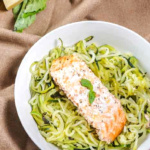Lemon zoodles with salmon and Parmesan cheese.