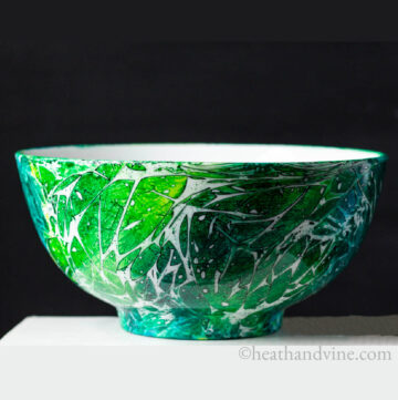 Alcohol ink with plastic printed ceramic bowl in blues and greens.