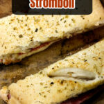 Slices of Italian stromboli on a baking stone.