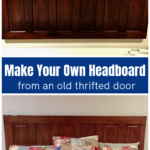 An old door on a wall over the same with a bed in front as a headboard.