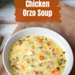 Bowl of lemon chicken orzo soup.