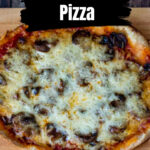 Close view of a slow cooker pizza with mushrooms and cheese.