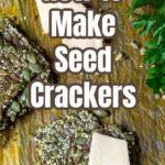 Seed crackers with a piece of white cheddar cheese.