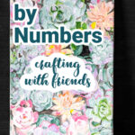 Multi-colored succulent plants from a paint by numbers kits.