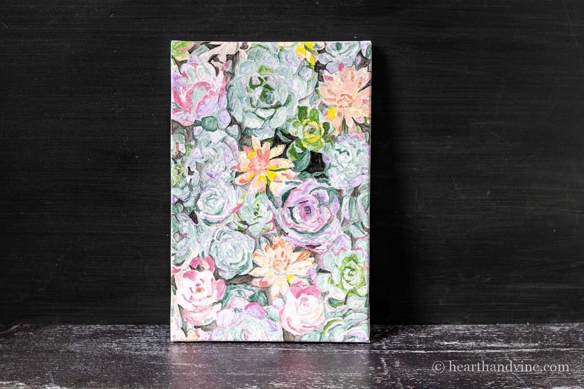 The completed colorful succulent plant painting from the paint by numbers kit.