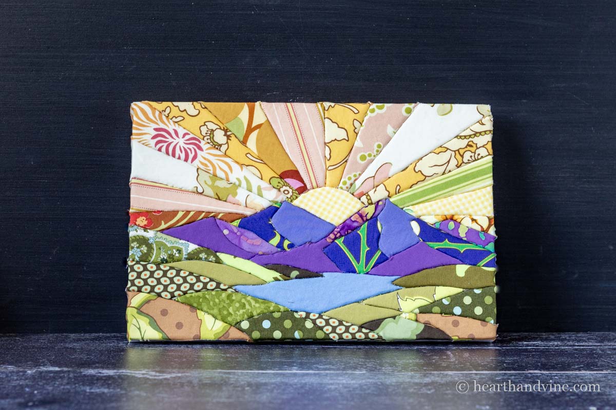 The completed Kinusaiga art craft leaning on a chalkboard.