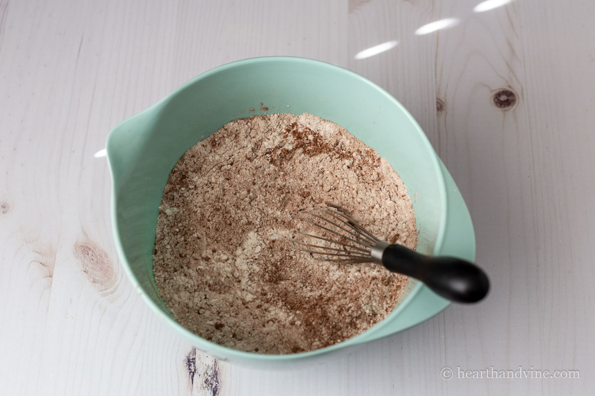 Flour, cocoa, and salt in a mixing bowl with a wire whisk.