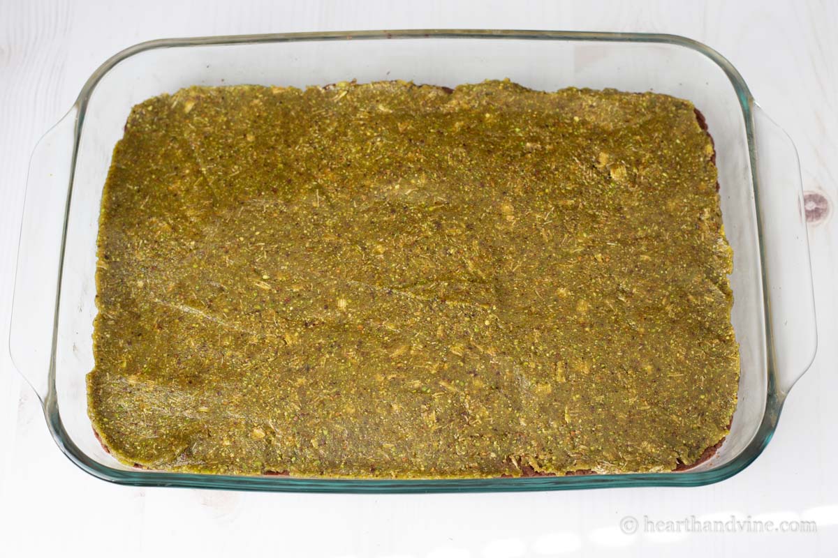 The pistachio mixture spread evenly over the crust.