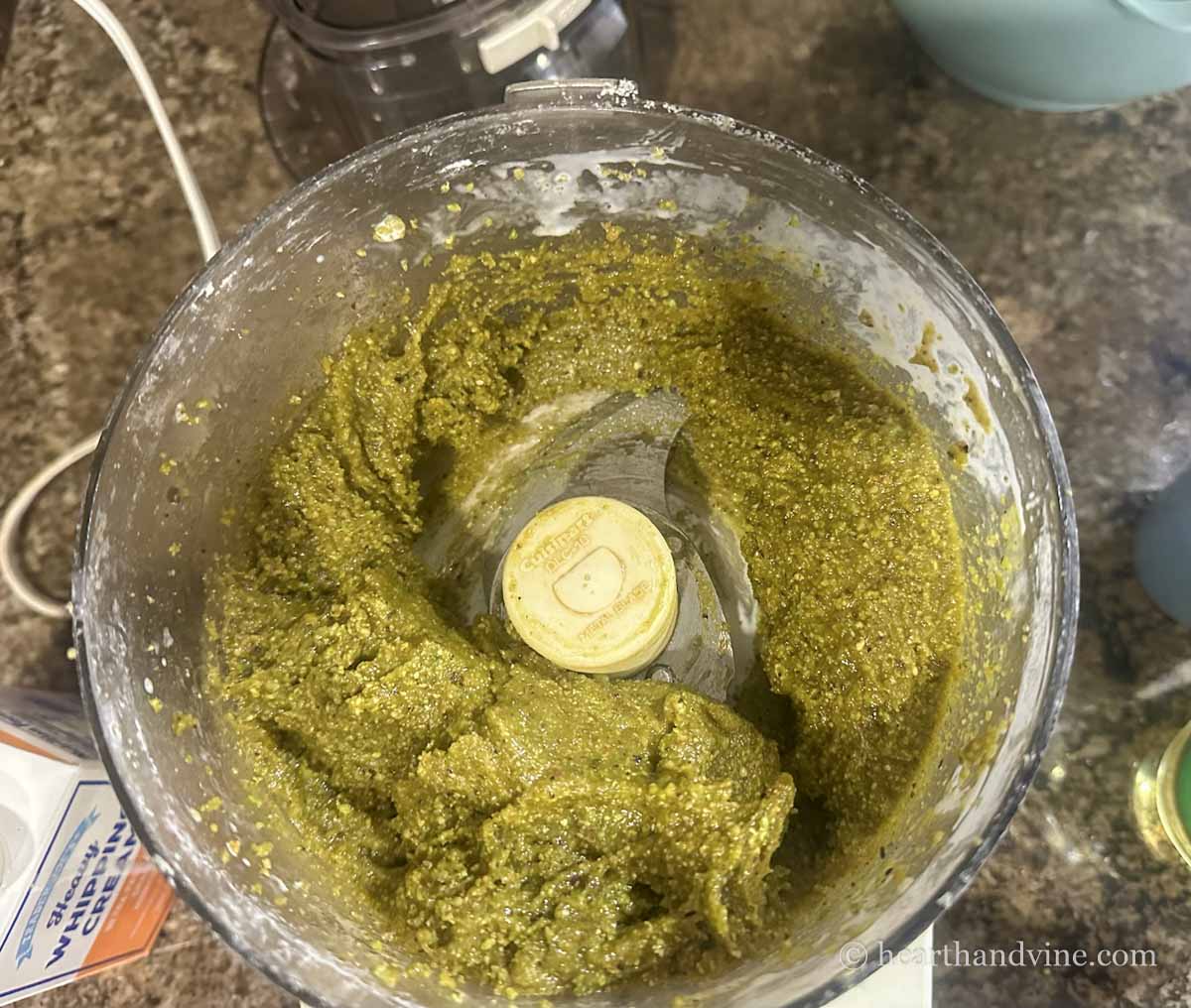 Pistachios, oil, cream and sugar, blended in a food processor.