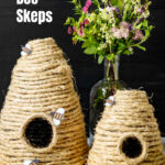 Two different size handmade decorative bee skeps.