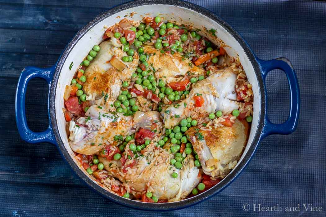Aerial view of a Dutch oven with arroz con pollo.