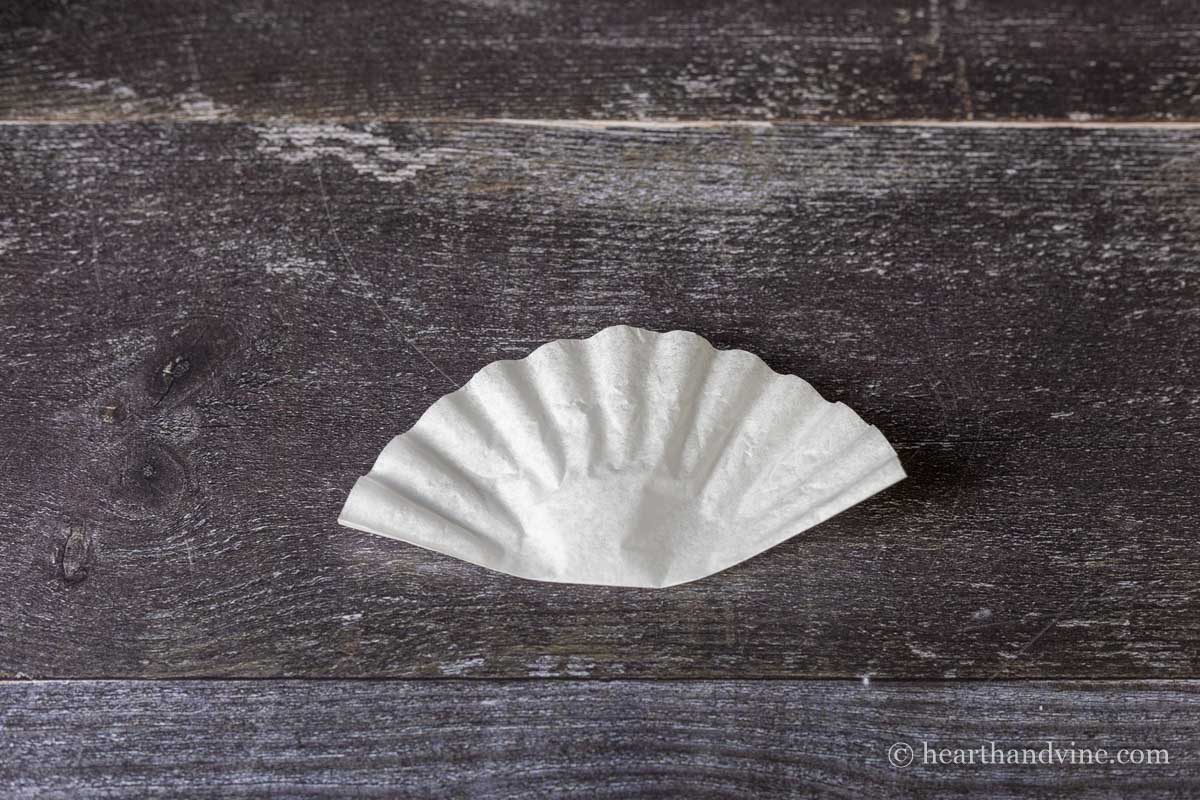 Coffee filter folded in half.