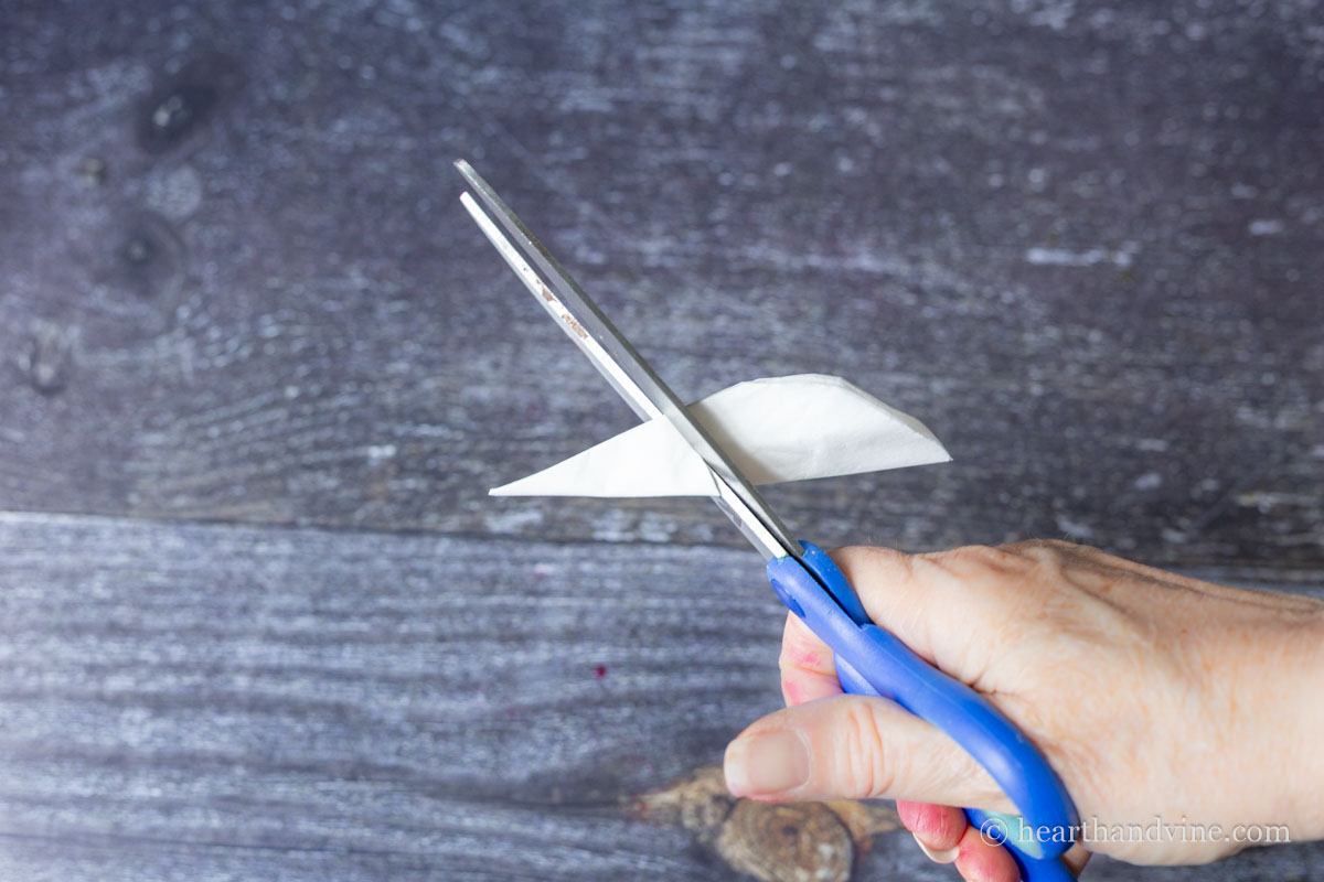 Cutting a small flower.
