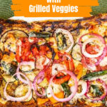Close view of grilled vegetables and cheese on puff pastry.