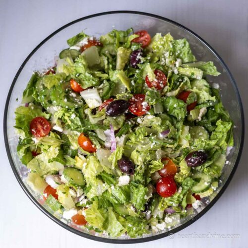 Large Greek salad in a glass bowl.