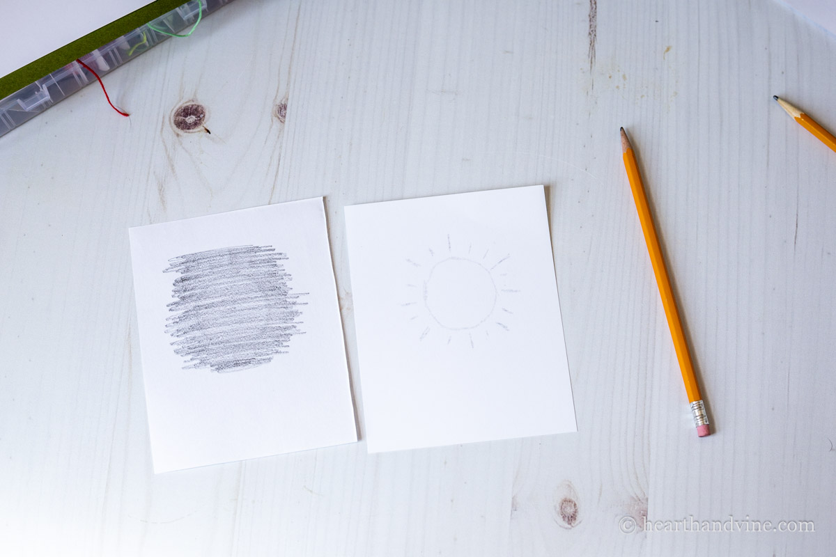 Drawing pencil over the back of the design then tracing the design on to card stock.