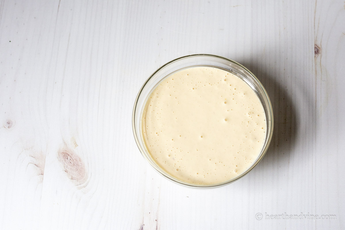 Bowl of homemade Caesar dressing.