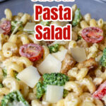 Partial view of a Caesar pasta salad with text overlay.