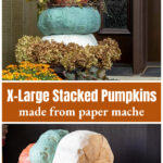 Three stacked paper mache pumpkins on a pot at a front door over the view of a rod inserted into the pumpkins for support.