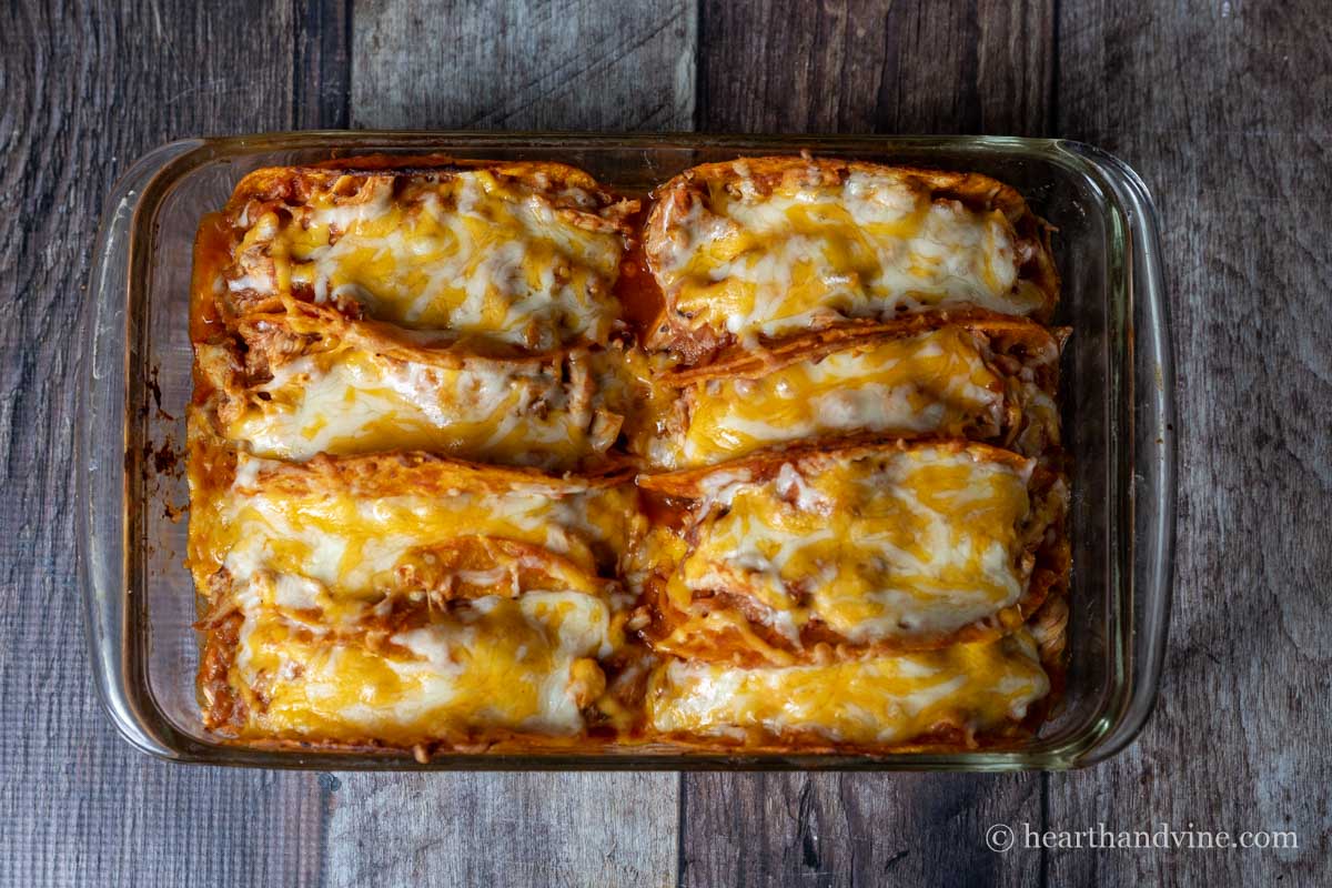 Baked chicken tacos in a baking dish.