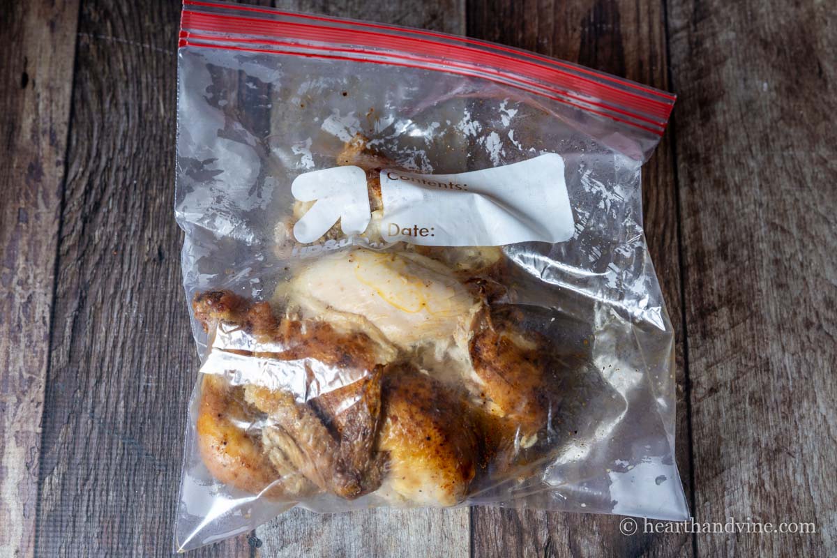 Whole rotisserie chicken in a zip bag.