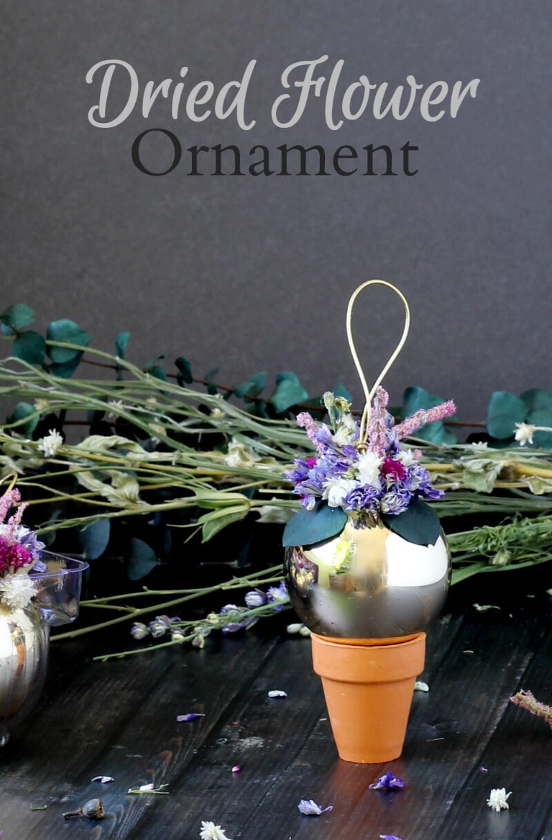 Learn how to make these dried flower ornaments with a simple glass or plastic ball, some dried flowers, and a hot glue gun.