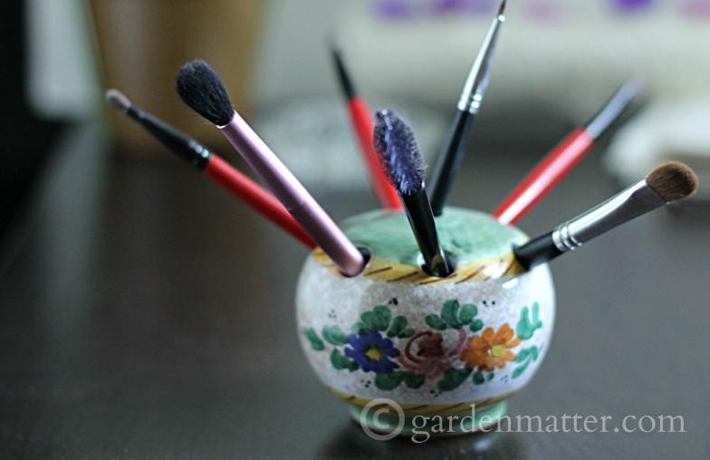 Floral Frog with Makeup Brushes