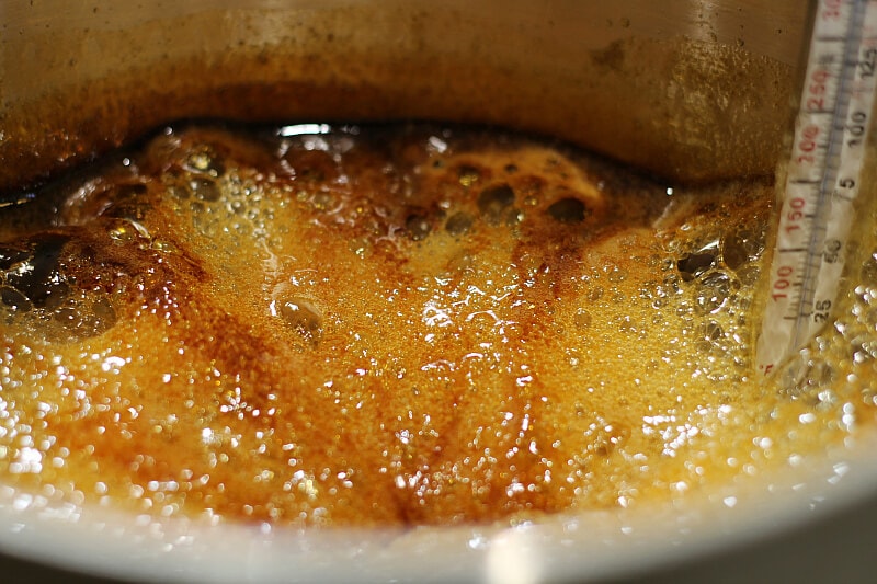 Pot with cough drop mixture boiling