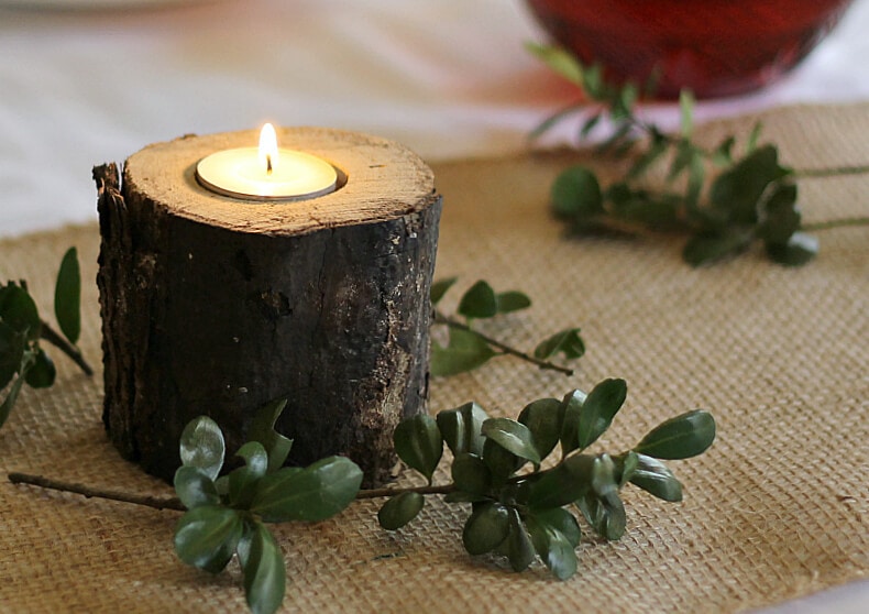 This tutorial for rustic log candlesticks costs virtually nothing to make and only takes about 1 hour for nine pretty candlesticks.