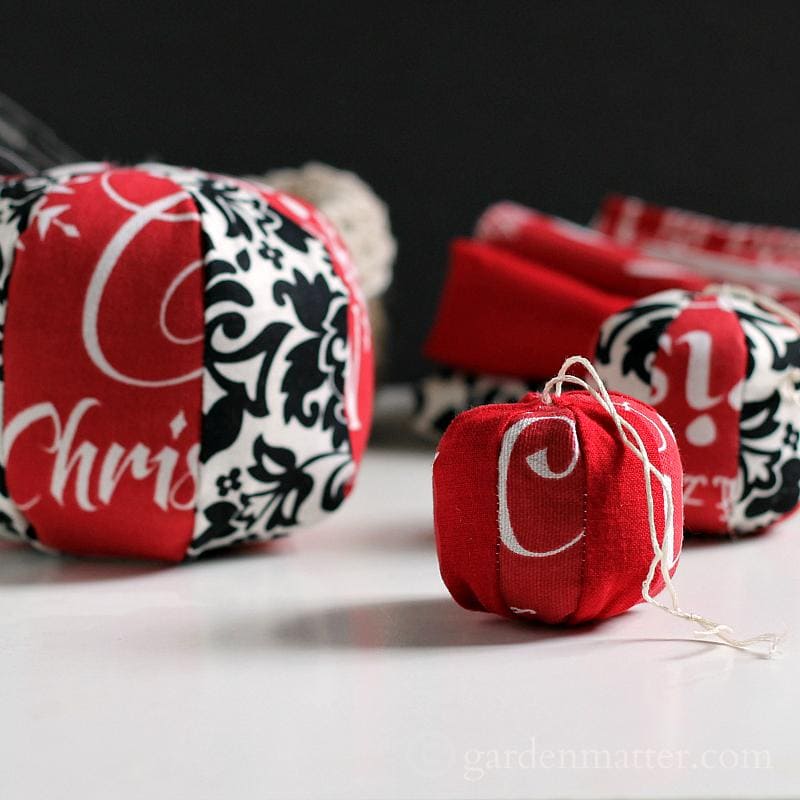 Learn how to make mini pouf ornaments with pretty fabric to brighten your tree.