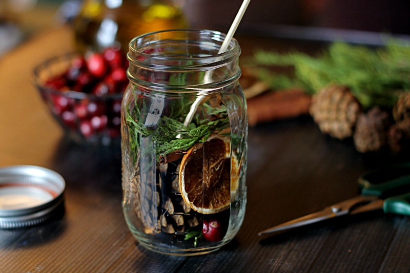 Mason jar filled with botanicals 