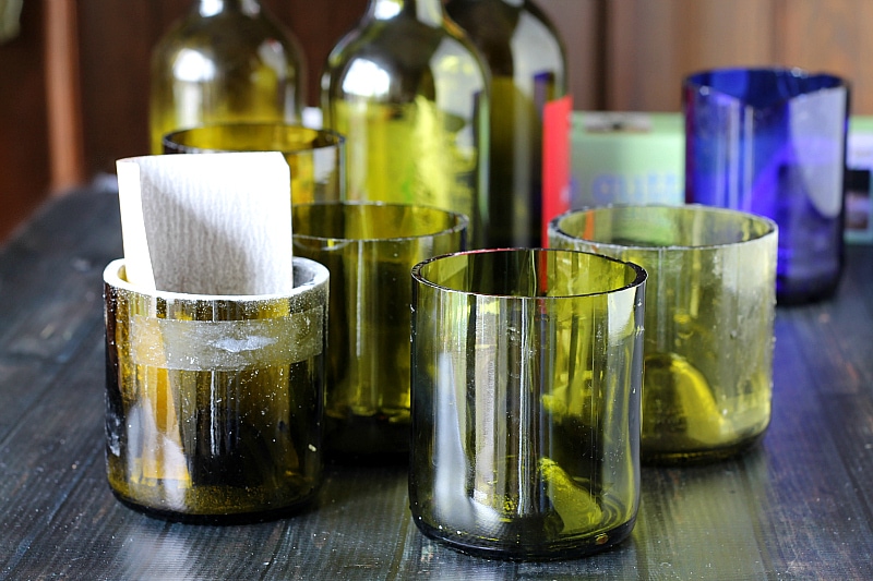 Sanding tops of cut wine bottles