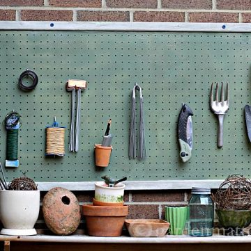 Adding a pegboard to your potting bench is a great decorative touch and a great way to organize all your gardening and other outdoor supplies.